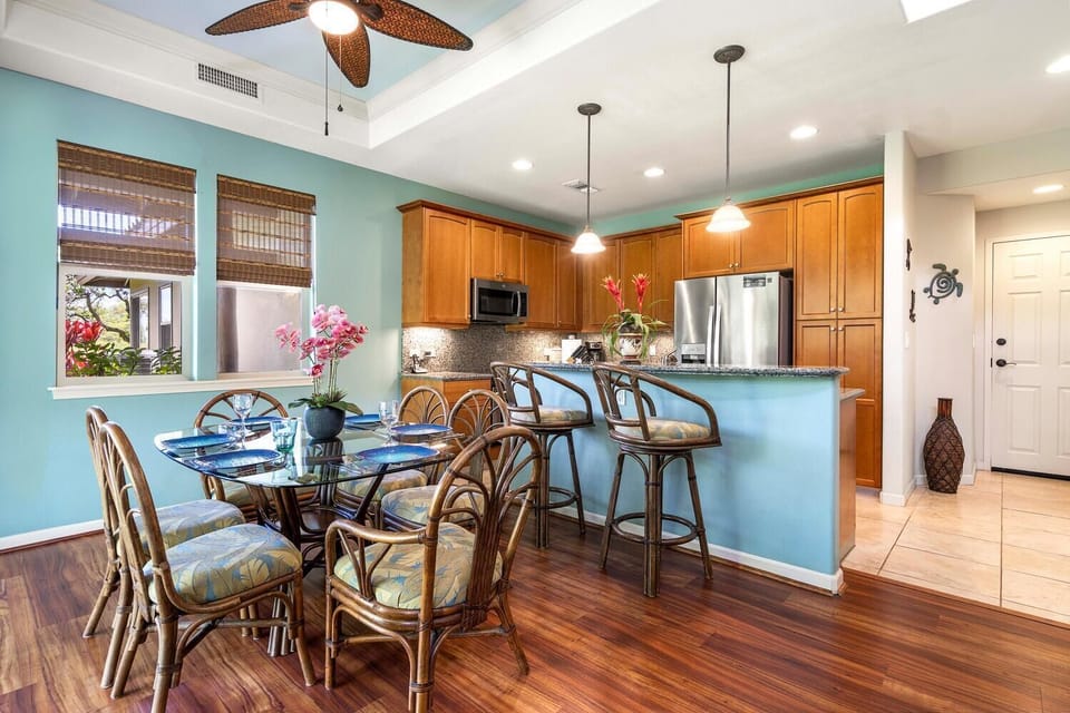 Dining Table, Chairs, Ceiling Fan, Breakfast Bar, and Refrigerator