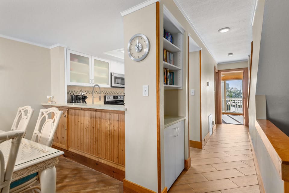 QC4: Trip's OBX | Mid Level Dining Area and Kitchen