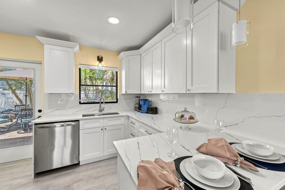 Prepare meals effortlessly in the bright, modern kitchen designed for both function and style, with everything within reach.