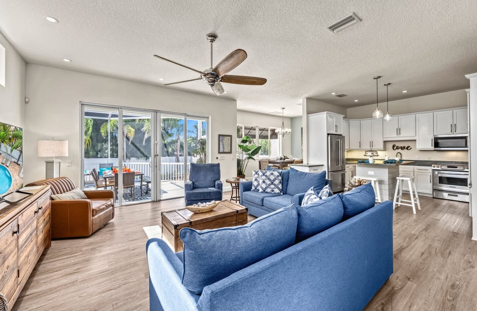 An inviting view showing how the living space flows into dining and kitchen.