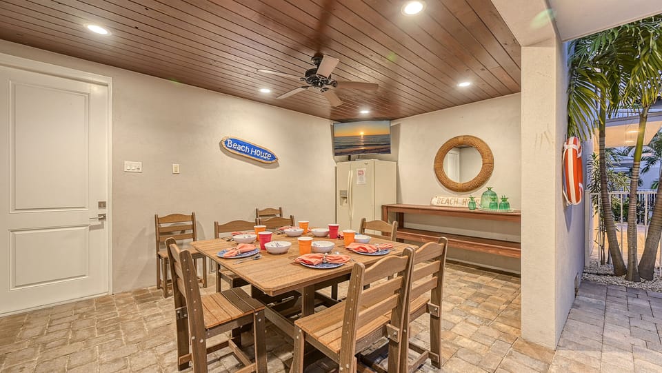 Gather 'round this inviting table to share meals, stories, and laughter late into the evening.