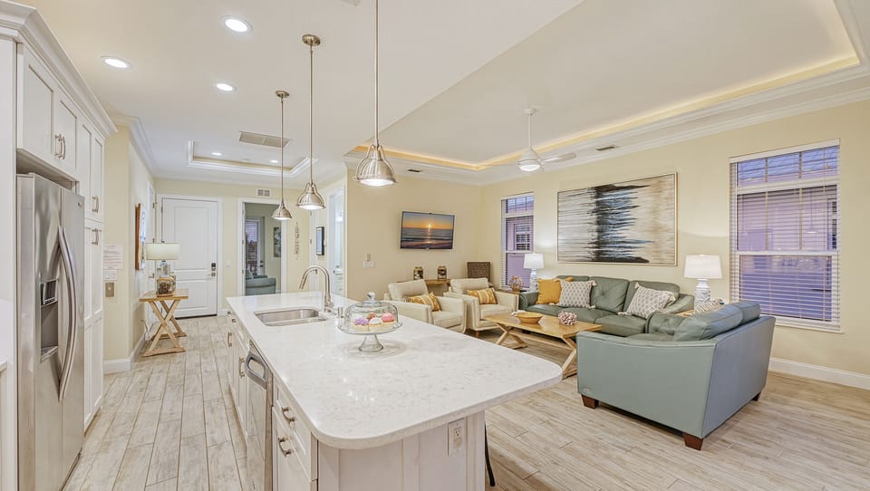 Prepare gourmet meals while staying connected to your guests in this seamless, open space.