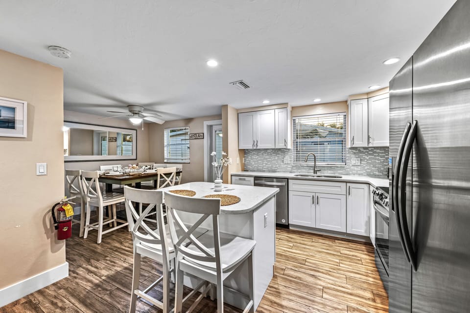 A welcoming space where cooking and conversation mingle effortlessly, creating the perfect backdrop for island living.