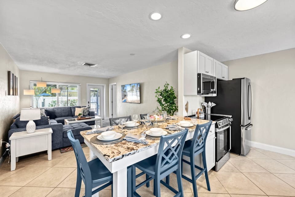 Gather for casual meals or morning coffee bathed in gentle natural light.