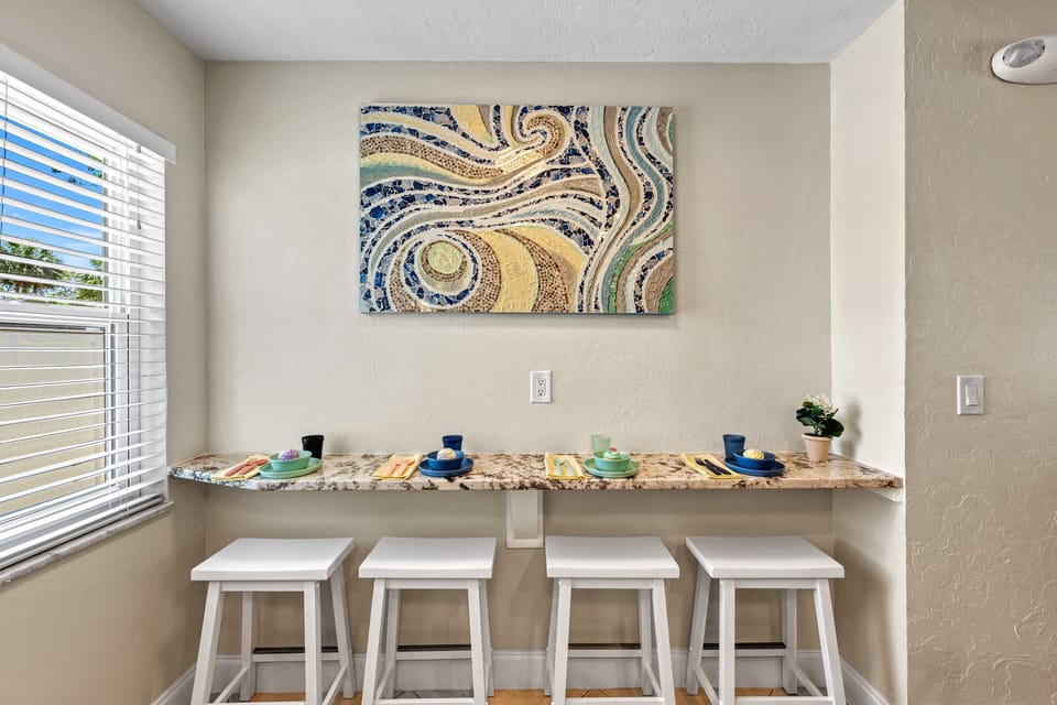 Pull up a seat for breezy breakfasts, quick bites, or sunset snacks fresh from the stove.