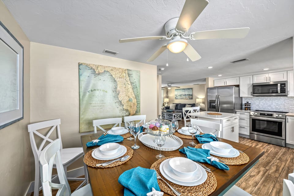 From table to stovetop, the flow is effortless—pass the pancakes fresh from the griddle, or toast to island life as the kitchen hums just steps away.