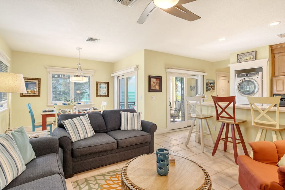Living Room with view of Dining area and kitchen breakfast bar. - 5540