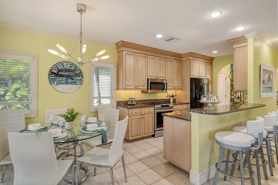 Dining Room & Kitchen.  Kitchen breakfast bar.