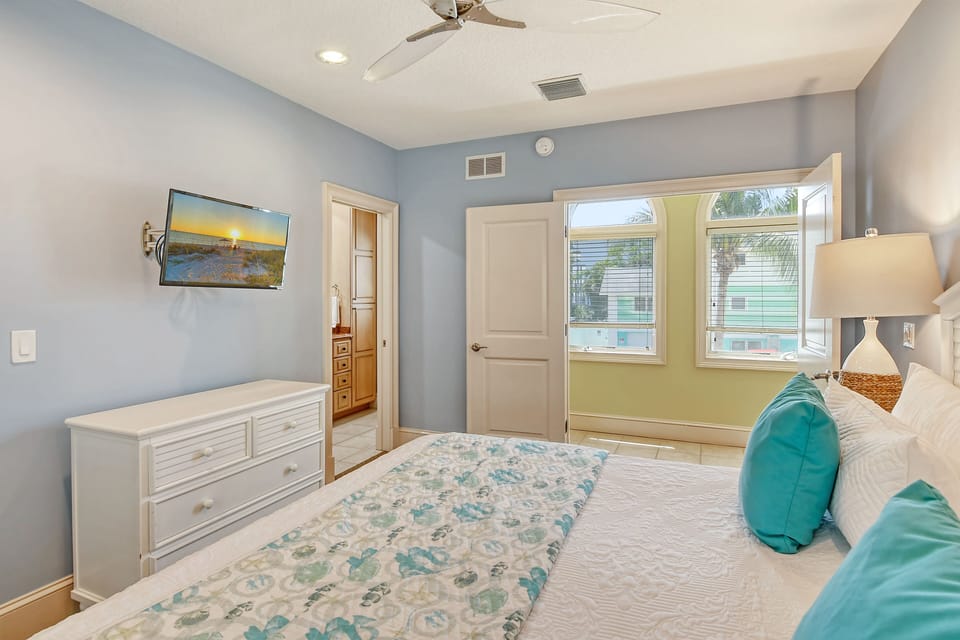 Bedroom 1 with in-room flat screen television.