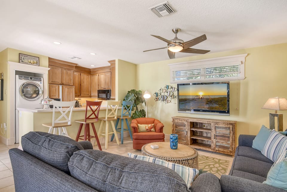 Living Room with kitchen and breakfast bar.