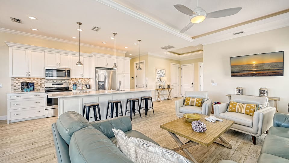 Wake up to the glow of morning light streaming through, blending cozy comfort with culinary excitement in one open, inviting space.