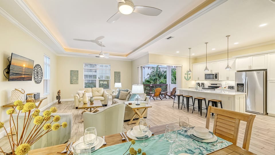 An inviting glimpse into the sophisticated coastal interiors, highlighting the airy design and stylish décor throughout the home.