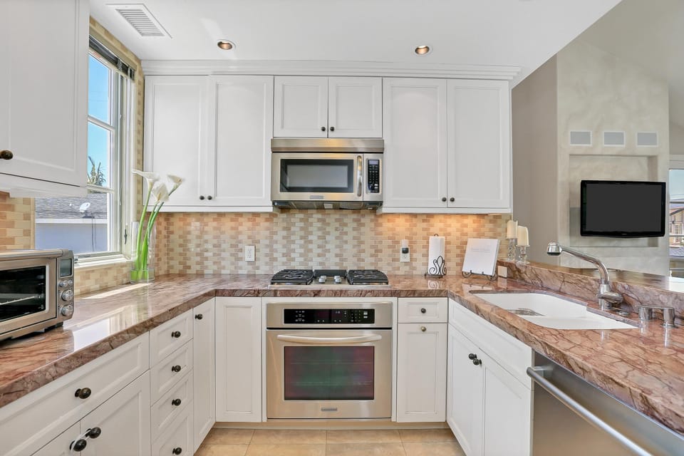 kitchen with most beautiful Brunello Imperial granite and state of the art appliances