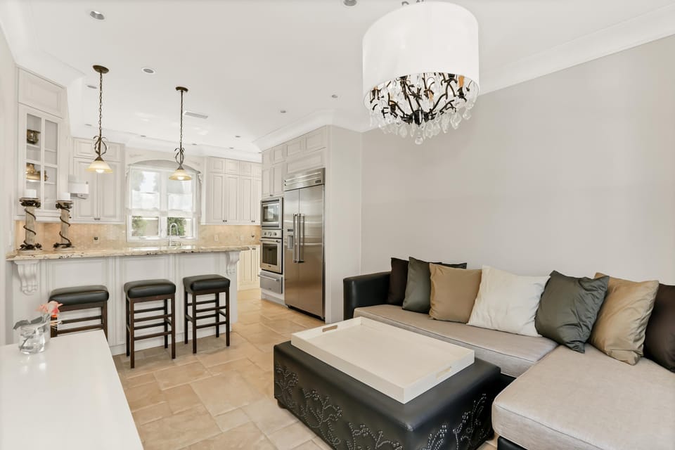 The contemporary floor plan feels spacious, bright, airy and yet cozy