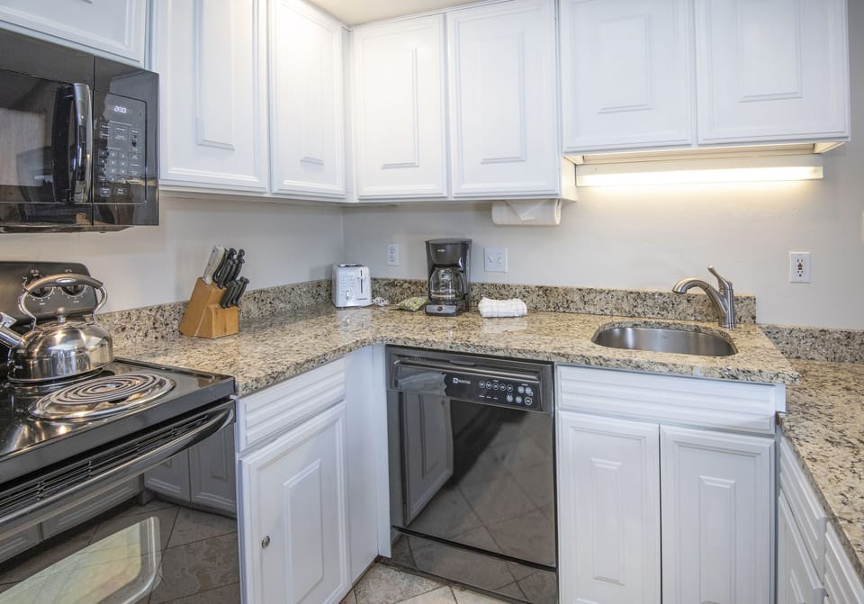 Kitchen - Kitchen with all the  necessary items to cook and entertain