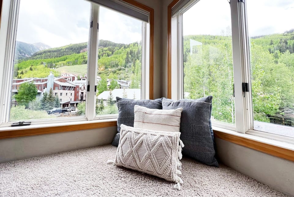 The perfect spot to enjoy mountain views, morning coffee, or a good book, this cozy bay window provides stunning mountain views and river sounds.