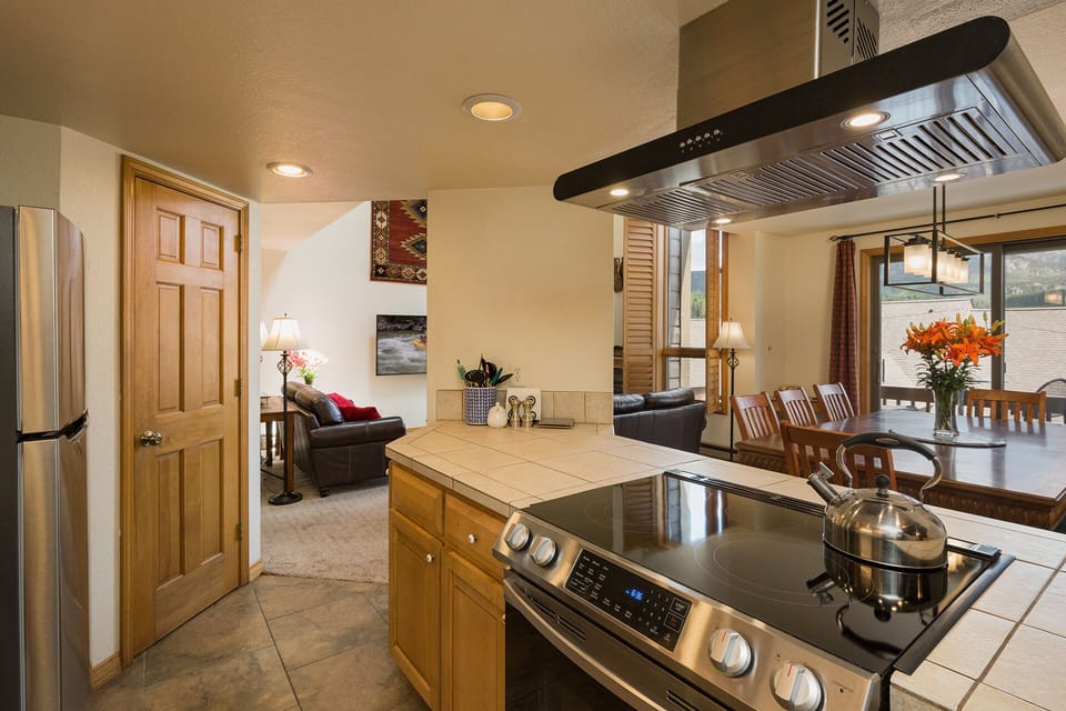 Kitchen overlooking dining and living room area