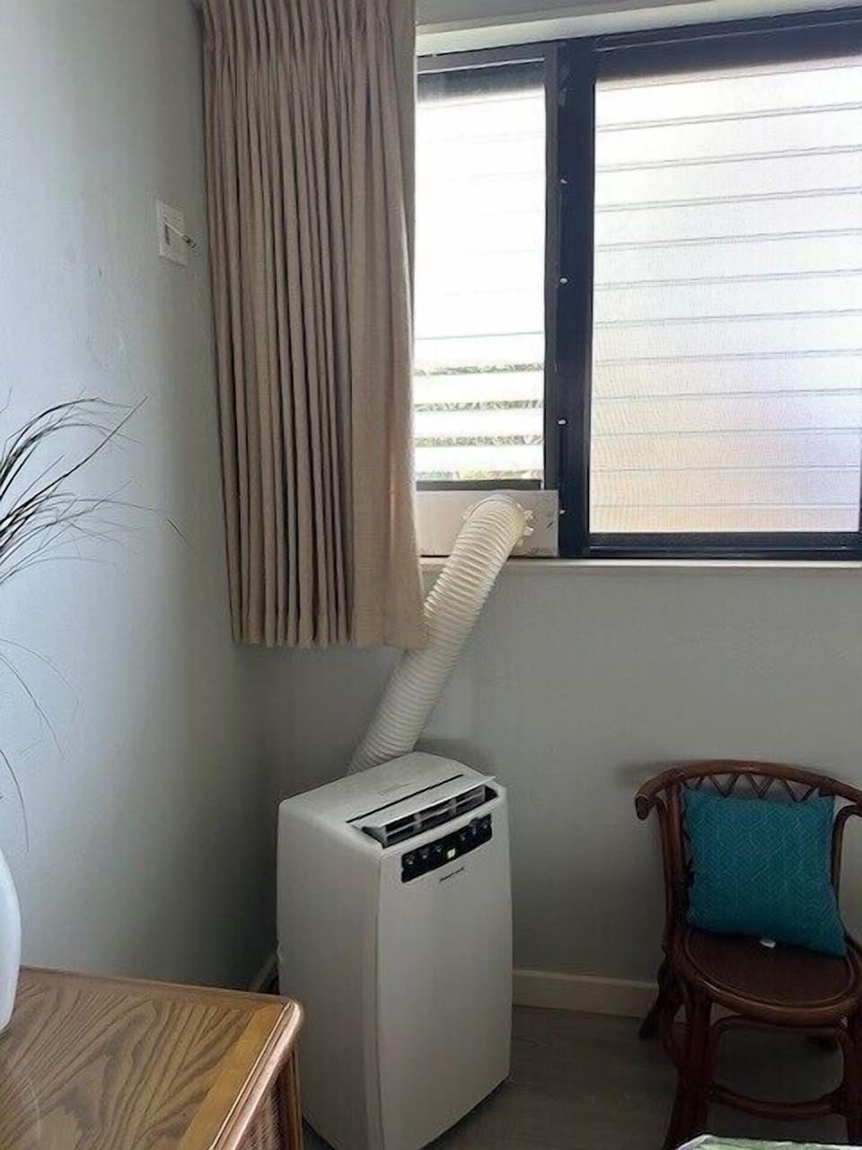 Portable AC - This portable AC keeps the main floor bedroom perfectly cool!