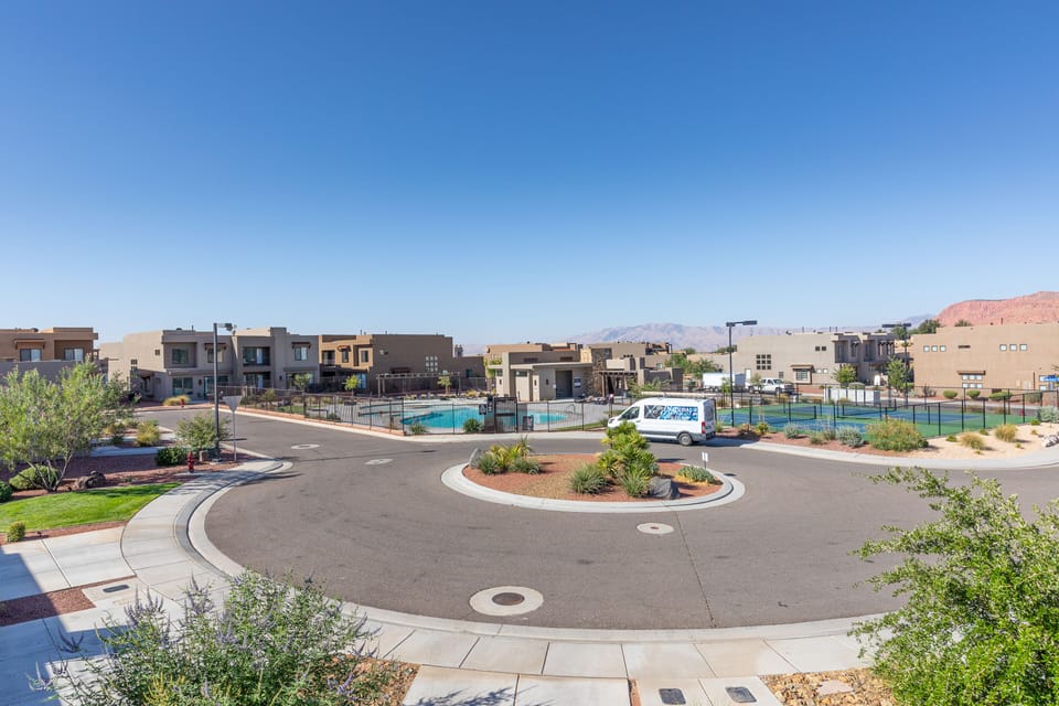 Amenity View - The view from your upstairs patio showing you the round-about and amenities.