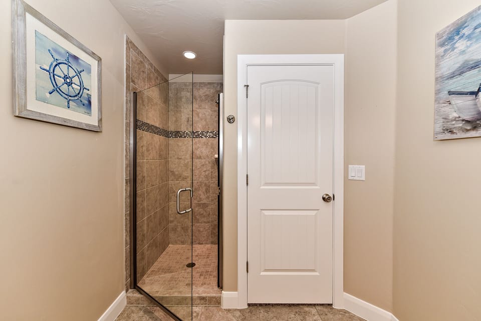 Bathroom 2 Shower - Bathroom 2 includes a walk-in shower and closet.