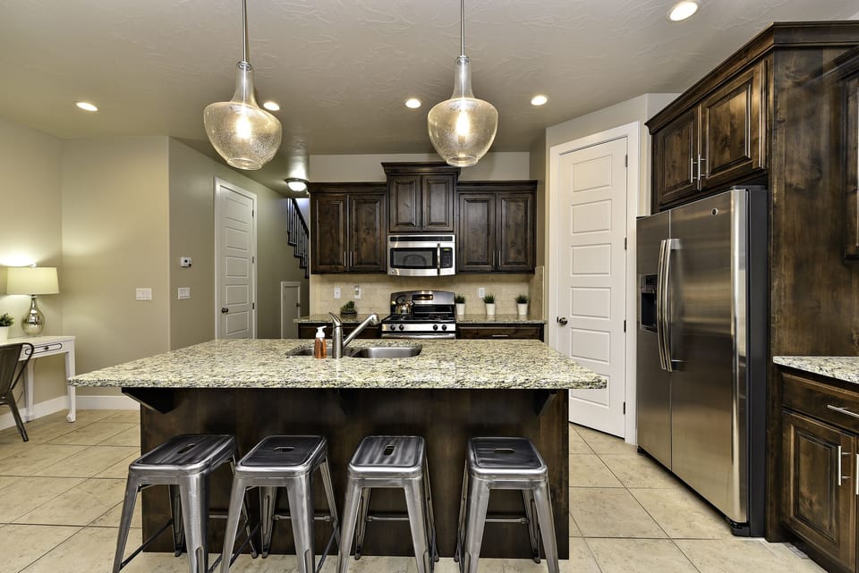 Kitchen Island - The Kitchen Island comfortably seats 4 adults and creates a great space for serving and preparing meals.