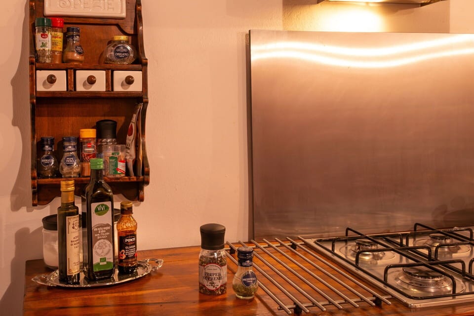 Kitchen Appliance, Kitchen, Kitchen Stove, Countertop, Cooktop, Major Appliance, Wood Stain, Gas Stove, Stove, Home Appliance