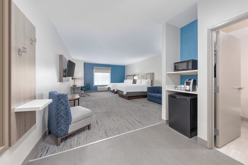 Suite, Multiple Beds | In-room safe, desk, laptop workspace, blackout drapes