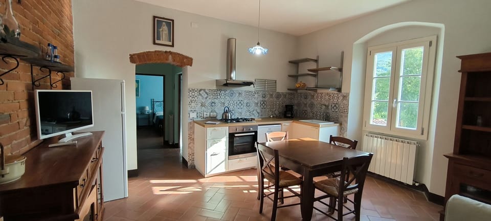 Furniture, Table, Cabinetry, Countertop, Kitchen, Wood, Window, Flooring, Interior Design, Floor