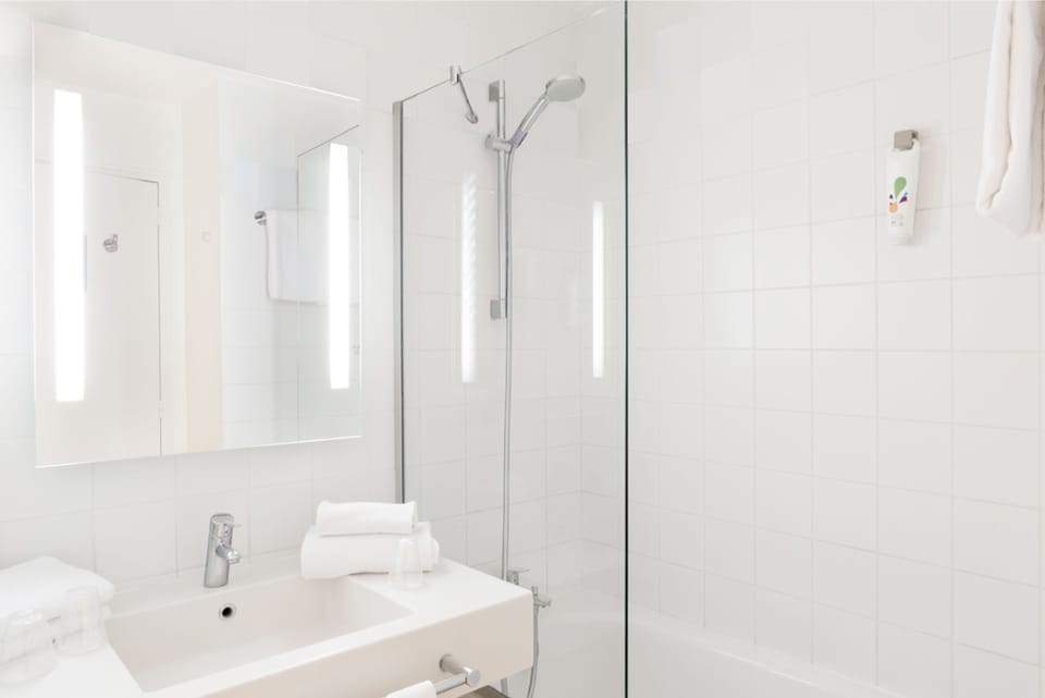 Eco-friendly toiletries, hair dryer, towels