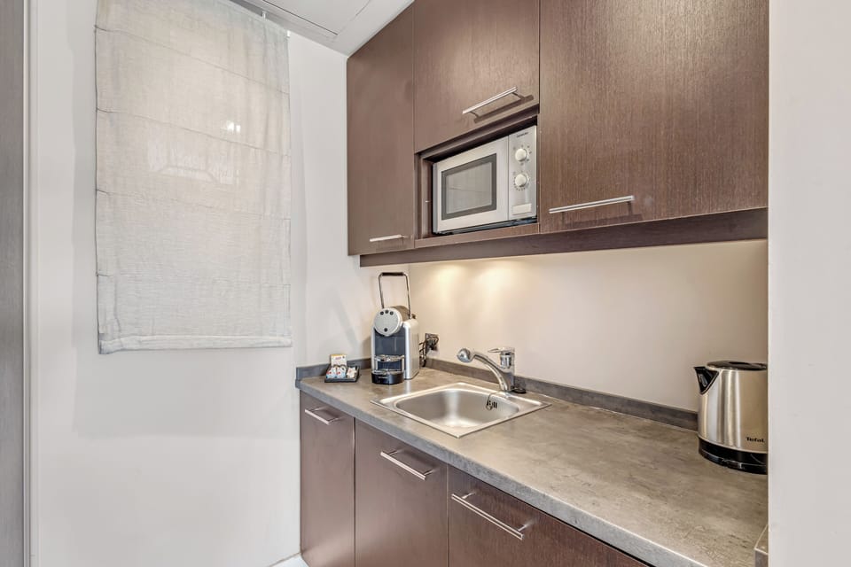 Deluxe Suite, 1 King Bed with Sofa bed | Private kitchen | Espresso maker, coffee/tea maker, fridge, microwave