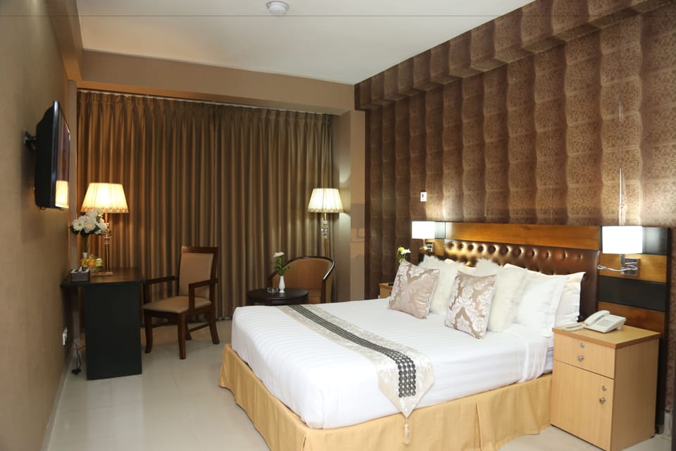 Family Suite, Multiple Beds | Premium bedding, minibar, in-room safe, desk