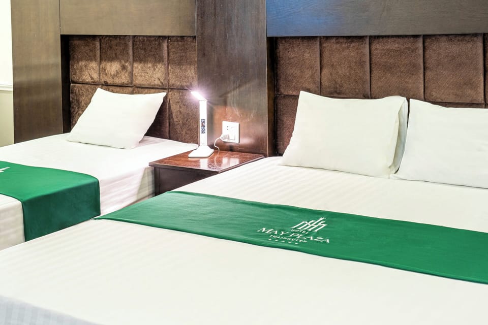 Elite Triple Room | Minibar, in-room safe, desk, laptop workspace