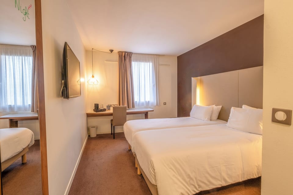 Premium bedding, individually furnished, desk, laptop workspace