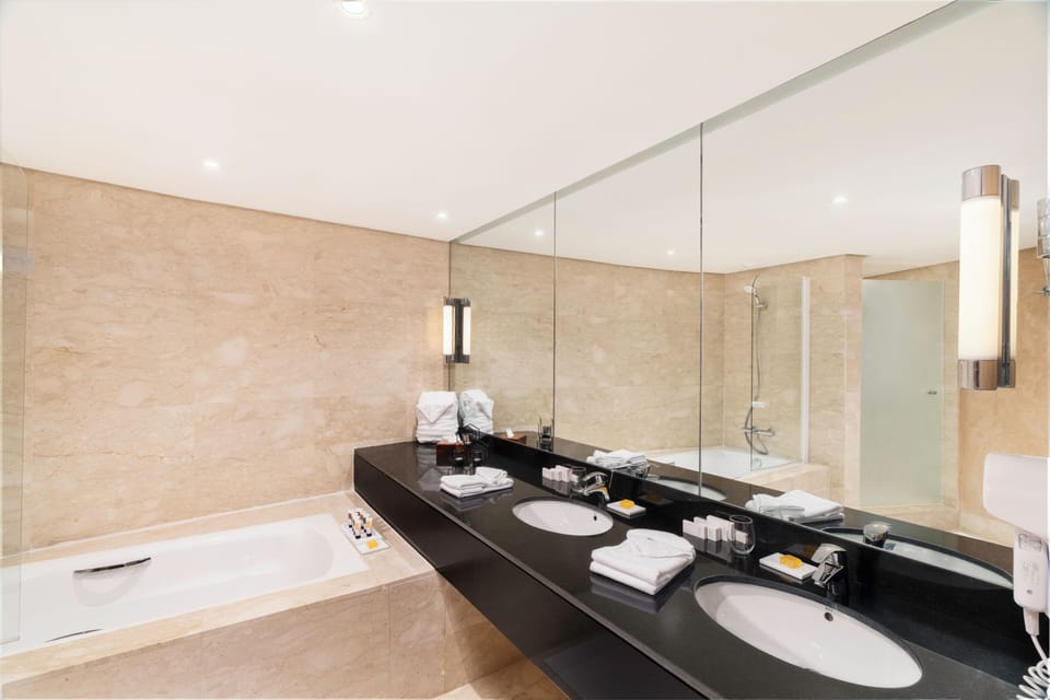 Bathtub, free toiletries, hair dryer, bathrobes