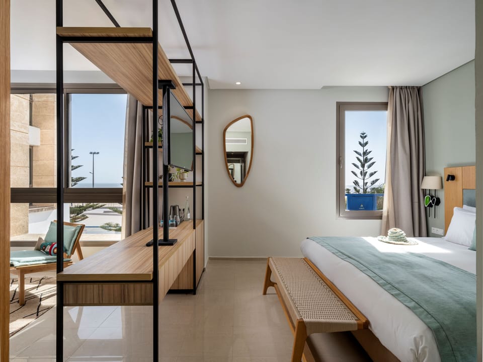 Deluxe Double Room, Sea View | Premium bedding, minibar, in-room safe, desk