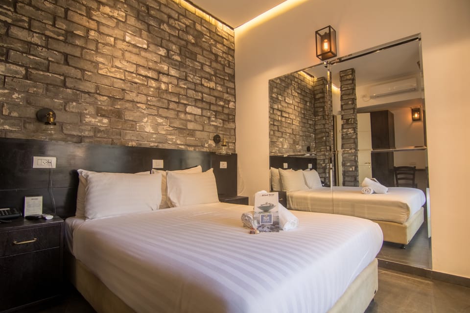Standard Double or Twin Room | In-room safe, desk, blackout drapes, iron/ironing board (on request)