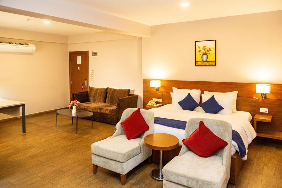 Deluxe Room, 1 Queen Bed | Desk, rollaway beds (surcharge), WiFi (free), bed sheets