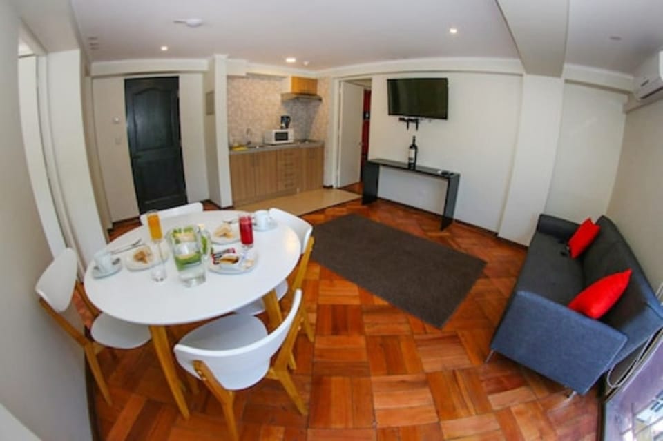 Family Room, Multiple Beds | Minibar, in-room safe, desk, iron/ironing board