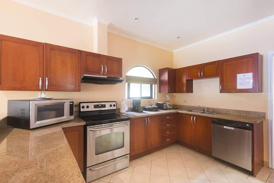 Open kitchen, stainless steel appliances