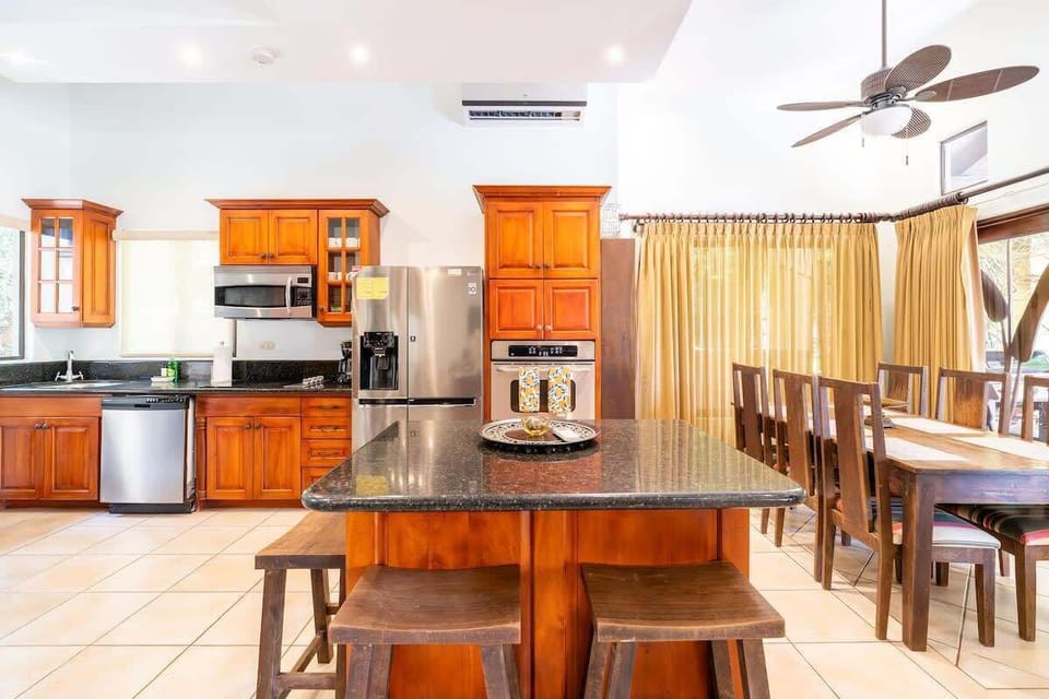 Dining Table and Kitchen Area