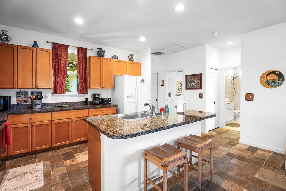 Large Open Kitchen with Access to Guest Bedrooms and Bathroom