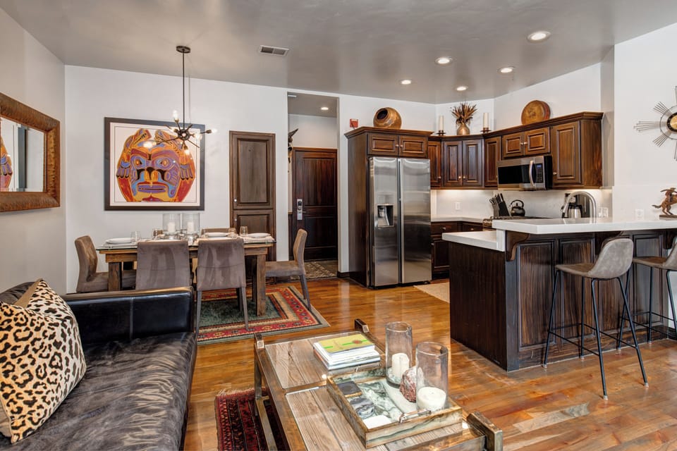 The open concept living, dining, and kitchen area.