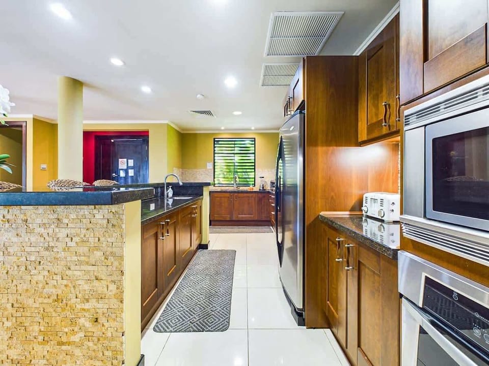 Open kitchen, stainless steel appliances