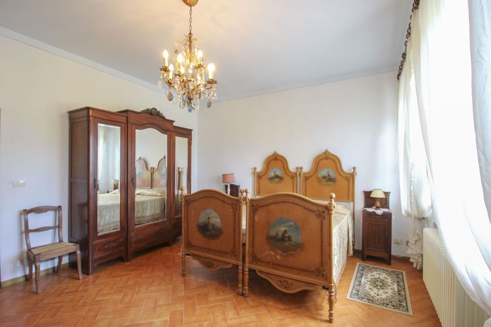 Furniture, Interior Design, Bedroom, Flooring, Bed, Floor, Wood, Room, Lighting, Bedding
