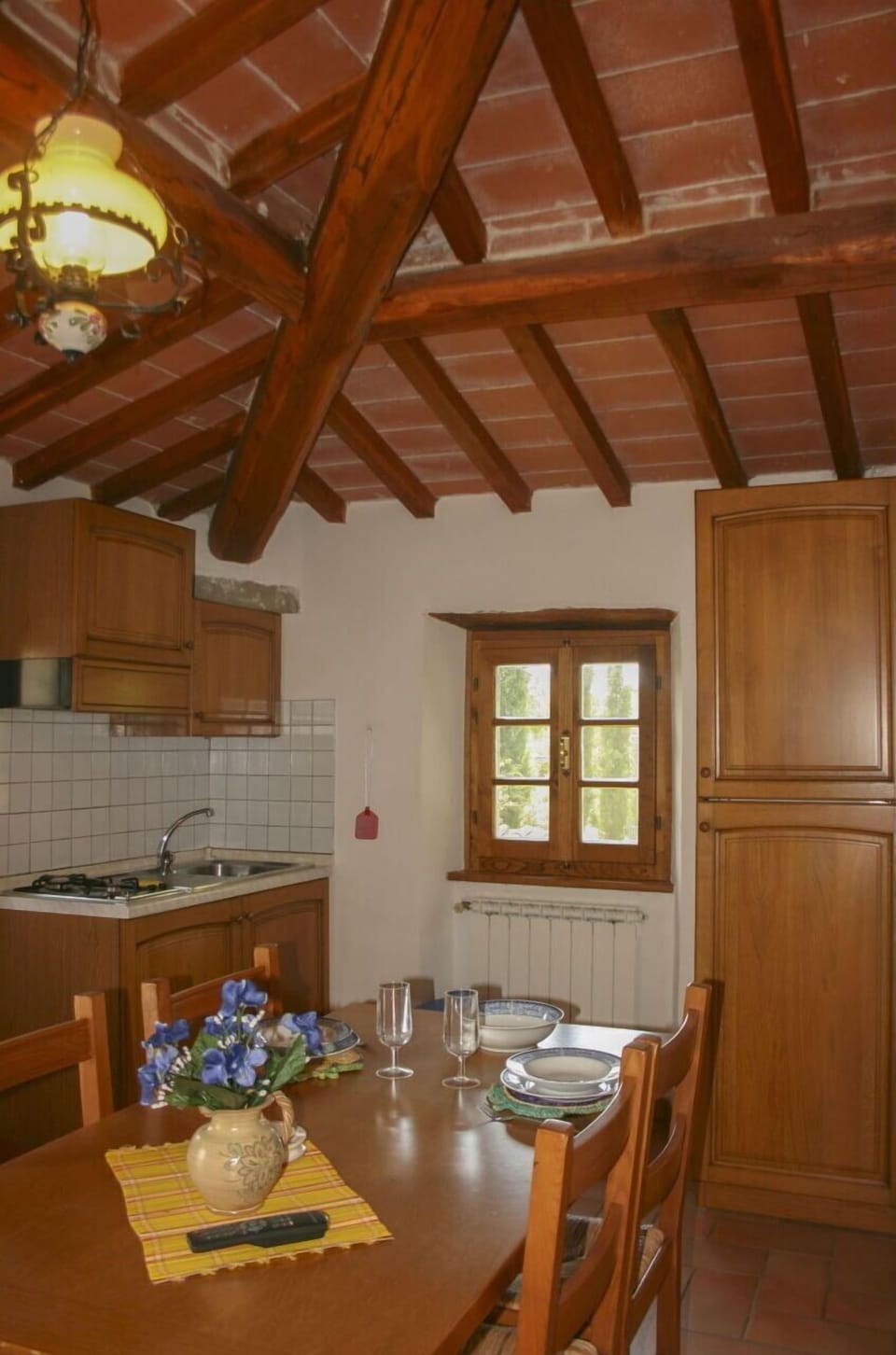 Wood, Interior Design, Furniture, Ceiling, Home, Wood Stain, Room, Hardwood, Cabinetry, Beam