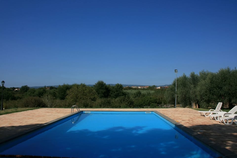 Water, Sky, Water Resources, Azure, Swimming Pool, Shade, Rectangle, Land Lot, Wood, Residential Area