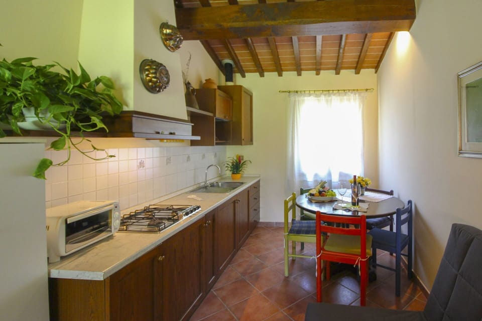 Furniture, Flooring, Interior Design, Floor, Kitchen & Dining Room Table, Room, Kitchen, Countertop, Ceiling, Wood Stain