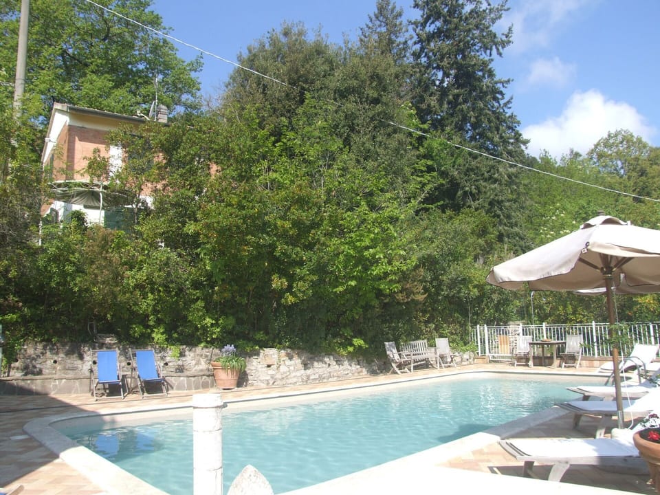 Water, Plant, Sky, Building, Cloud, Azure, Swimming Pool, Tree, Outdoor Furniture, Shade