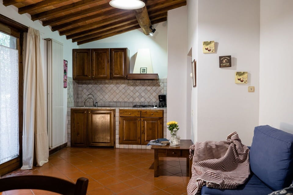 Furniture, Property, Wood, Living Room, Cabinetry, Interior Design, Floor, Flooring, Architecture, Houseplant