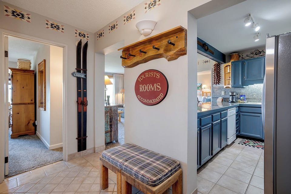 Step into your mountain retreat with rustic charm and modern comfort in the fully equipped kitchen.
